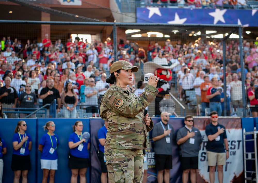 OC-ALC Commander Throws Ceremonial First Pitch at Women's College World Series Finals
