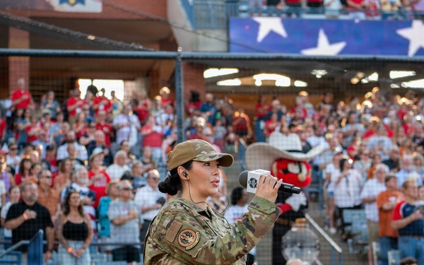 OC-ALC Commander Throws Ceremonial First Pitch at Women's College World Series Finals