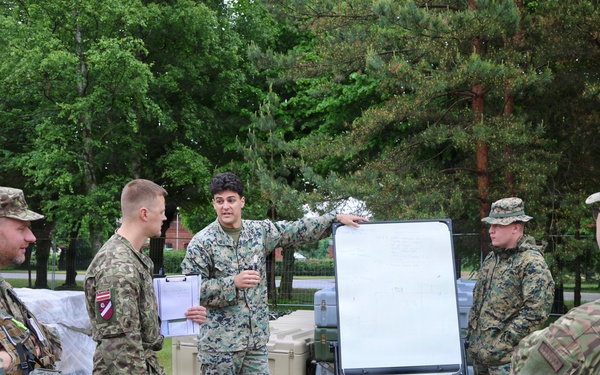 U.S., Latvian Forces Train for CBRN Response During BALTOPS 2026