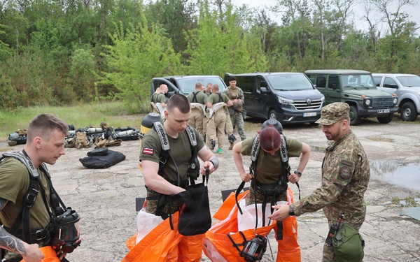 U.S., Latvian Forces Train for CBRN Response During BALTOPS 2026