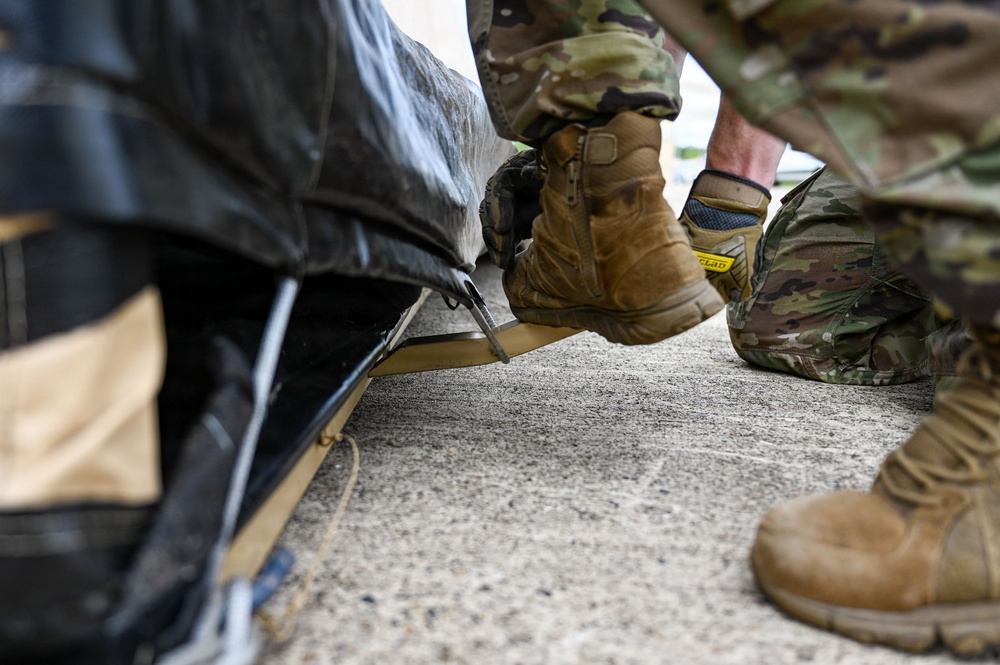 346th EABS Airmen build tents