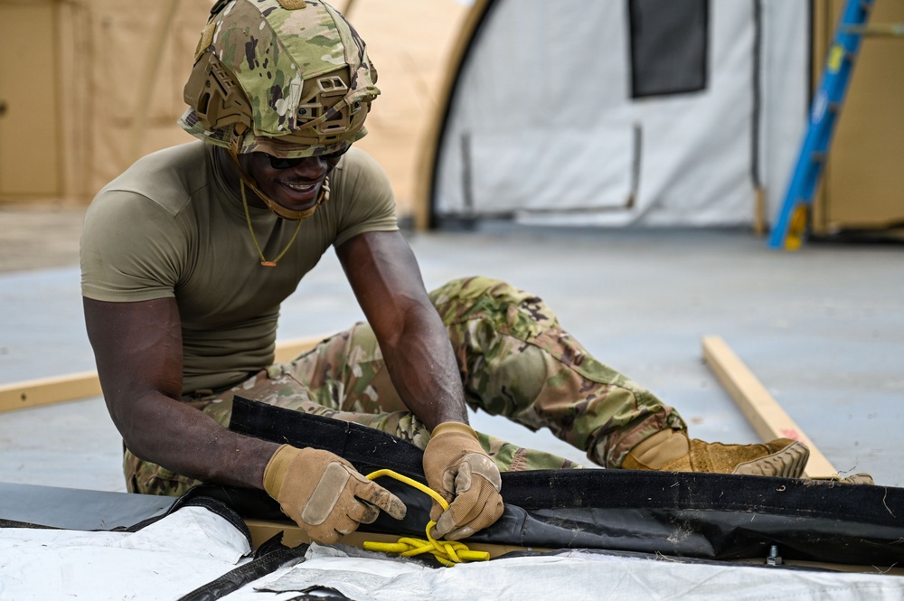 346th EABS Airmen build tents