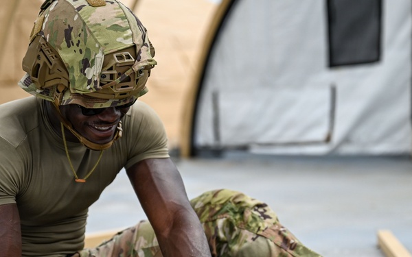 346th EABS Airmen build tents