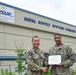 Lt. Cmdr. Christopher Munn receives fourth Meritorious Service Award
