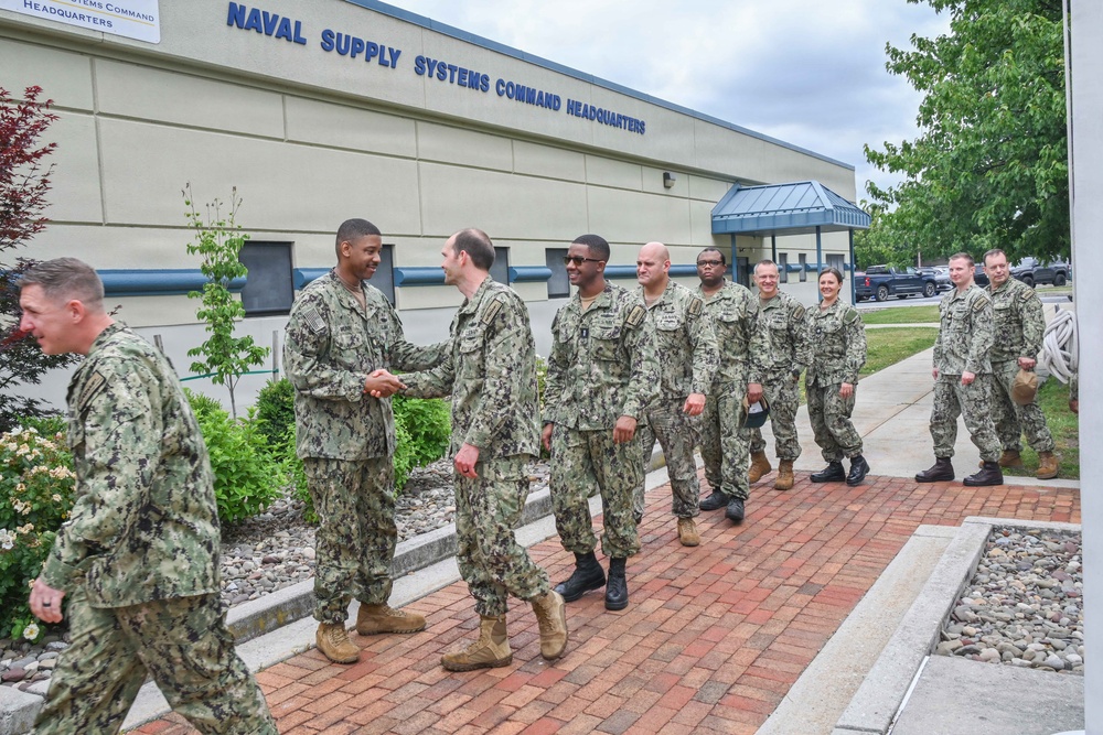 Lt. Cmdr. Christopher Munn receives fourth Meritorious Service Award
