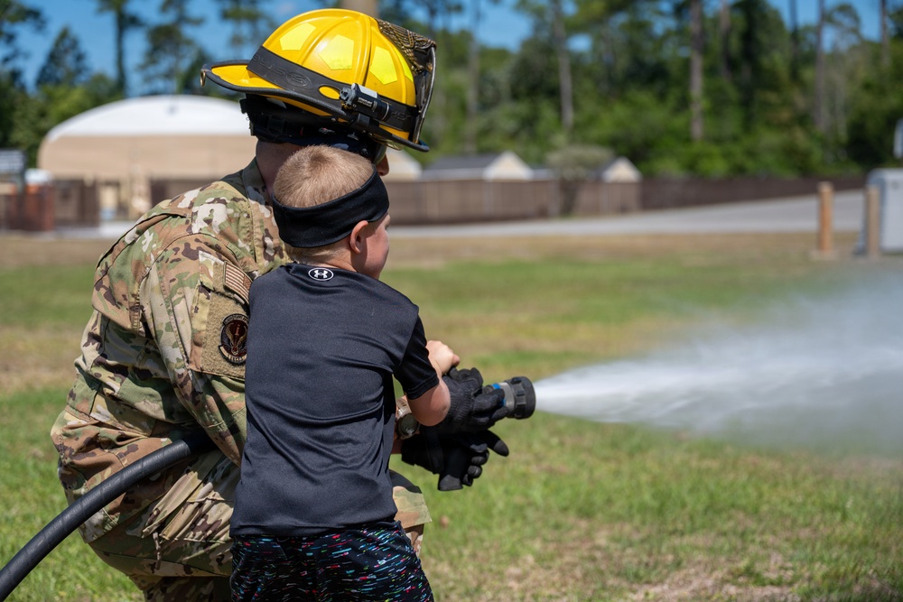 Military children learn about deployment cycles through interactive events
