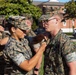 Never too far apart: Identical twins get promoted to the rank of Corporal