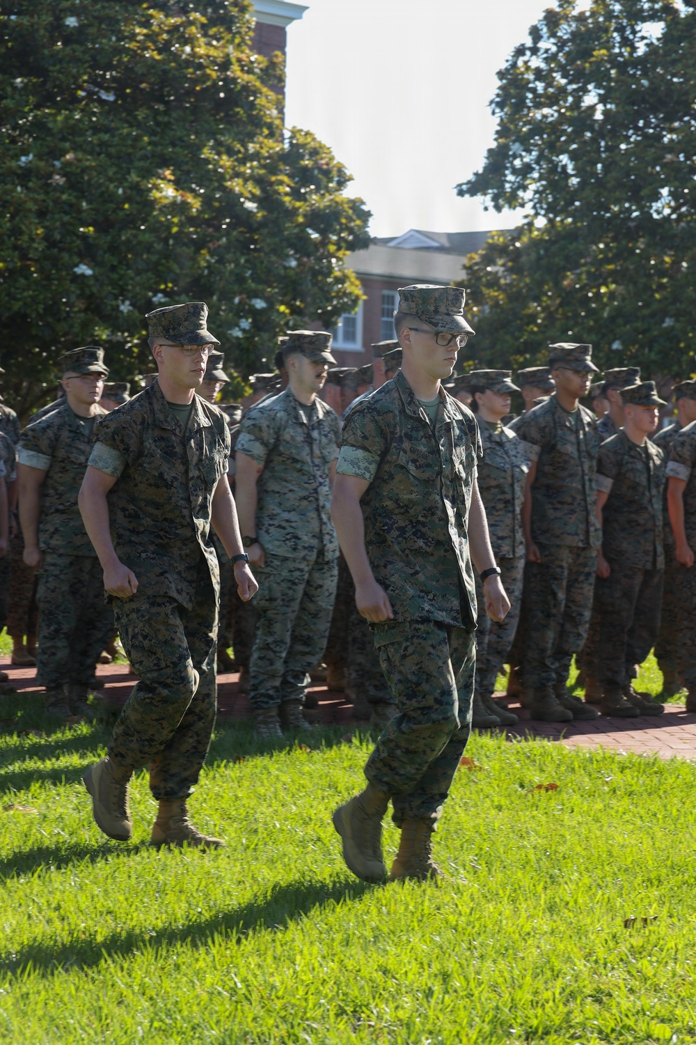 Never too far apart: Identical twins get promoted to the rank of Corporal