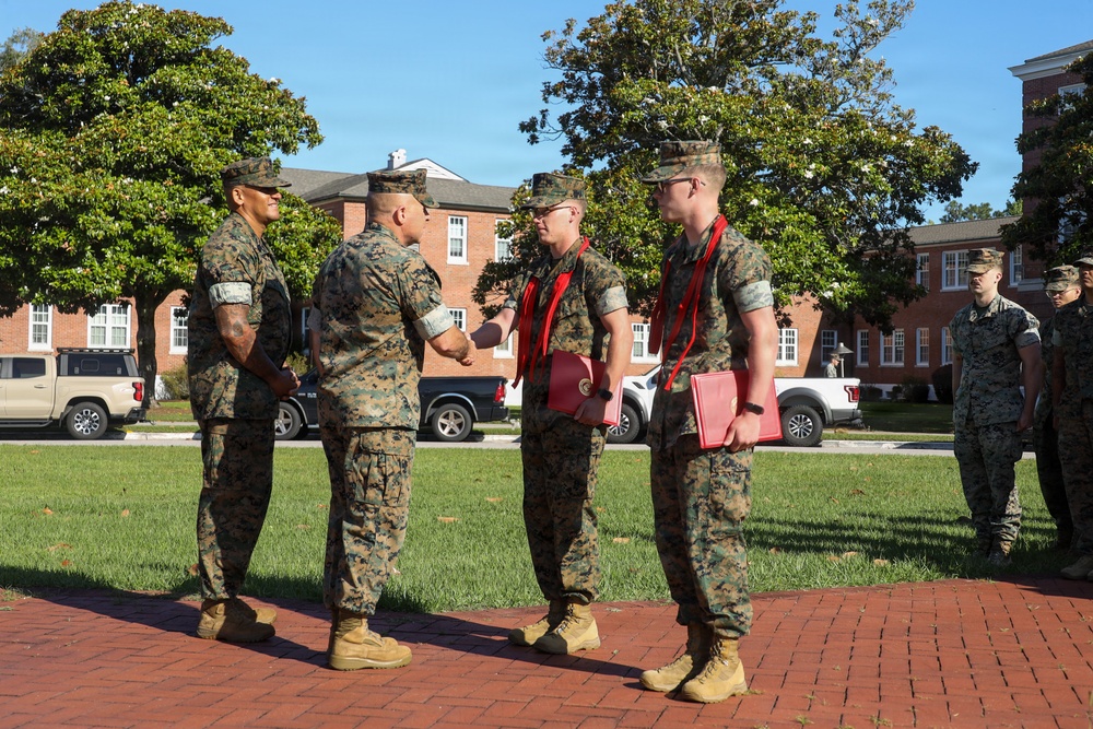 Never too far apart: Identical twins get promoted to the rank of Corporal