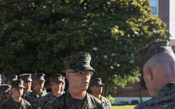 Never too far apart: Identical twins get promoted to the rank of Corporal