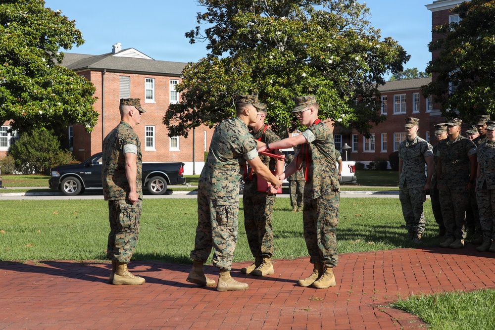 Never too far apart: Identical twins get promoted to the rank of Corporal