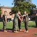 Never too far apart: Identical twins get promoted to the rank of Corporal