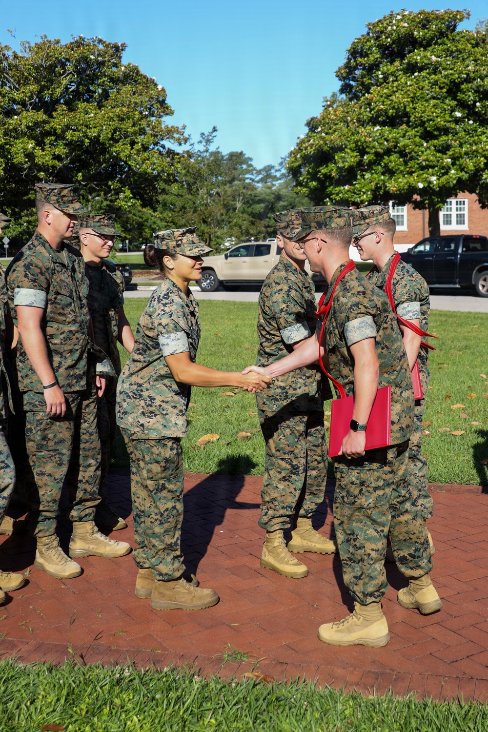 Never too far apart: Identical twins get promoted to the rank of Corporal