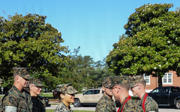 Never too far apart: Identical twins get promoted to the rank of Corporal