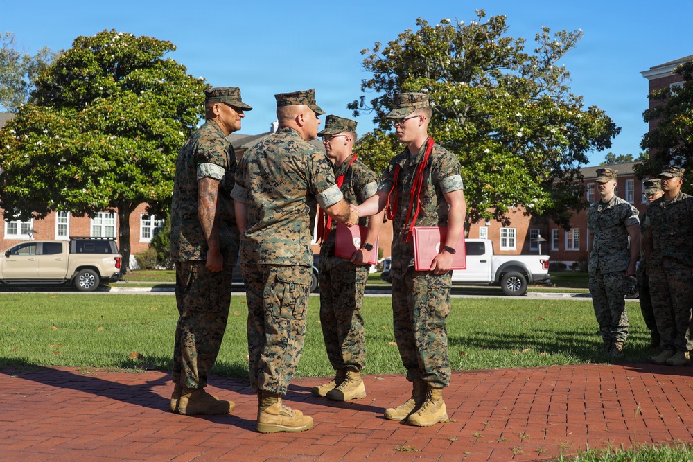 Never too far apart: Identical twins get promoted to the rank of Corporal
