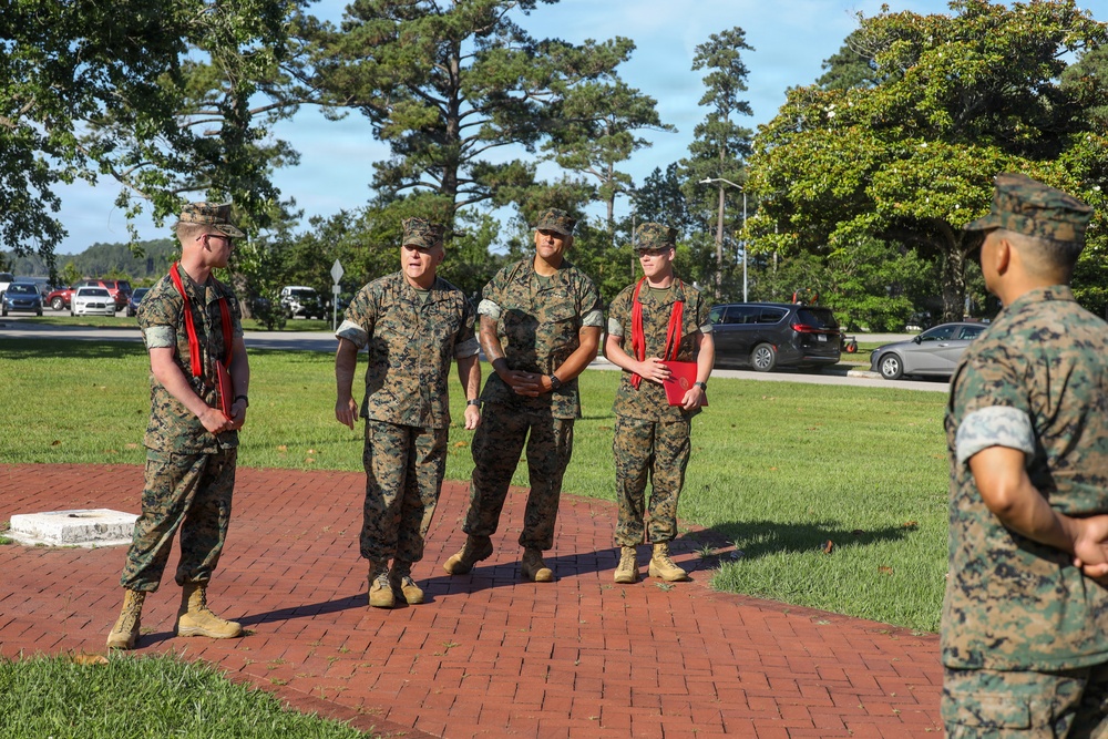 Never too far apart: Identical twins get promoted to the rank of Corporal