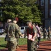 Never too far apart: Identical twins get promoted to the rank of Corporal