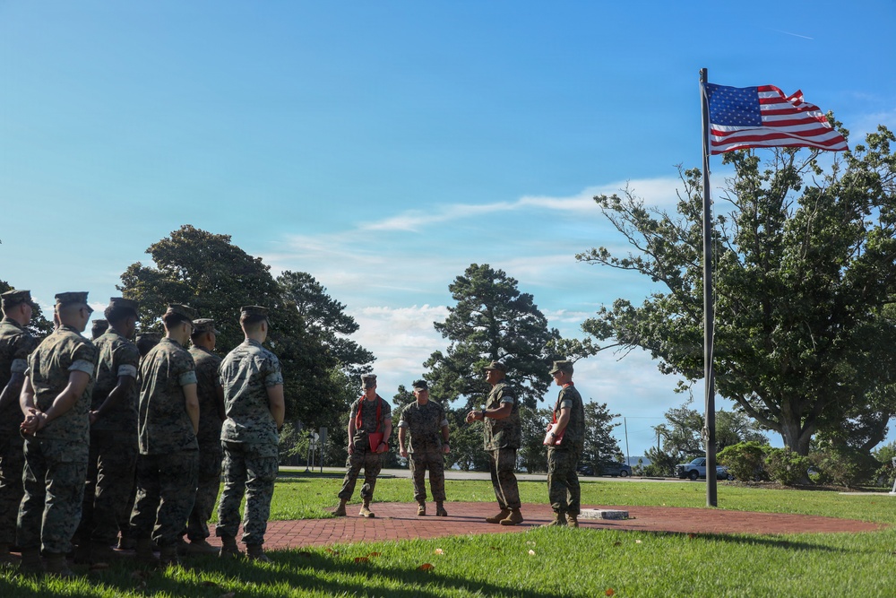 Never too far apart: Identical twins get promoted to the rank of Corporal