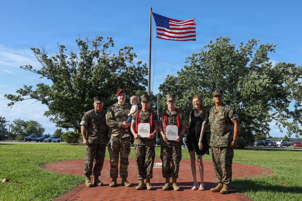 Never too far apart: Identical twins get promoted to the rank of Corporal