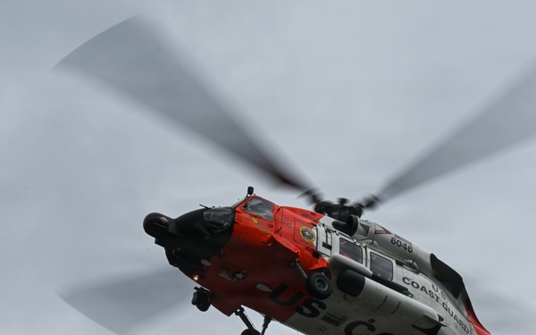 U.S. Coast Guard Air Station Astoria crew works alongside Oregon National Guard, Clackamas County Fire Department and other partner agencies during a full-scale inland water rescue training exercise in Sandy Oregon.