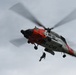 U.S. Coast Guard Air Station Astoria crew works alongside Oregon National Guard, Clackamas County Fire Department and other partner agencies during a full-scale inland water rescue training exercise in Sandy Oregon.