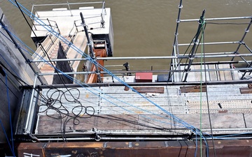 Contractors perform repairs on Tainter Gates 14 and 15 at Robert S. Kerr