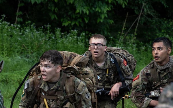 Soldiers Participate in Ruck March During E3B Testing