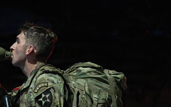 Soldiers Participate in Ruck March During E3B Testing