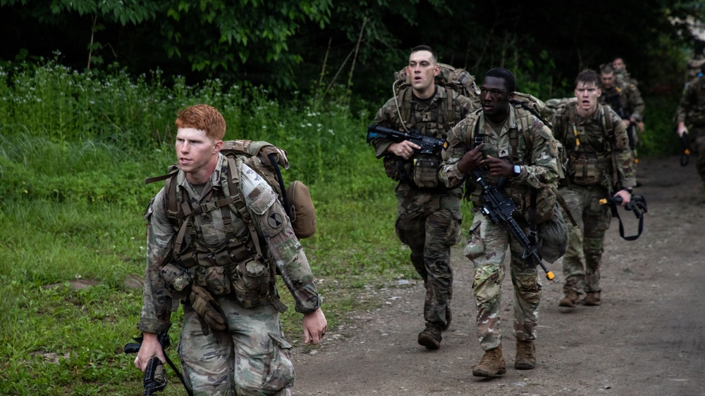 Soldiers Participate in Ruck March During E3B Testing