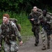 Soldiers Participate in Ruck March During E3B Testing