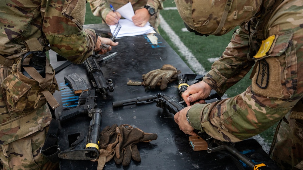 Soldiers Participate in Ruck March During E3B Testing