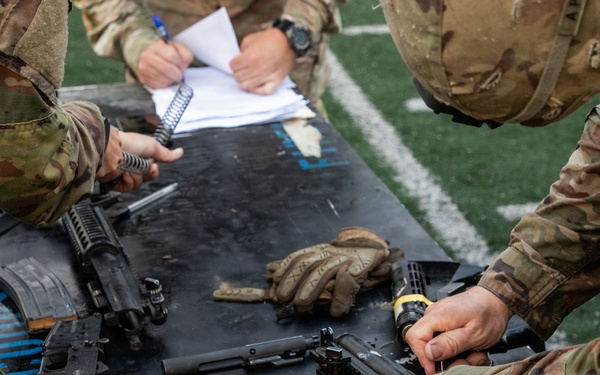 Soldiers Participate in Ruck March During E3B Testing
