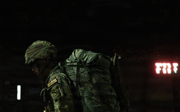 Soldiers Participate in Ruck March During E3B Testing