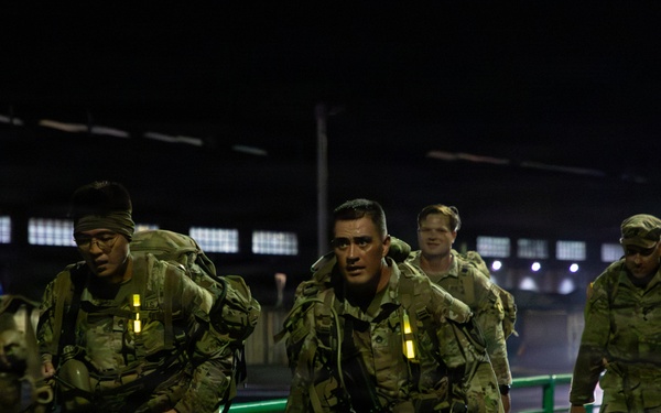 Soldiers Participate in Ruck March During E3B Testing