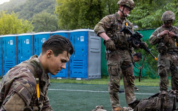 Soldiers Participate in Ruck March During E3B Testing