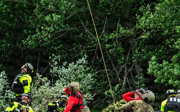 Oregon National Guard members collaborated with the Clackamas Fire Department and additional first responders to conduct aviation rescue training