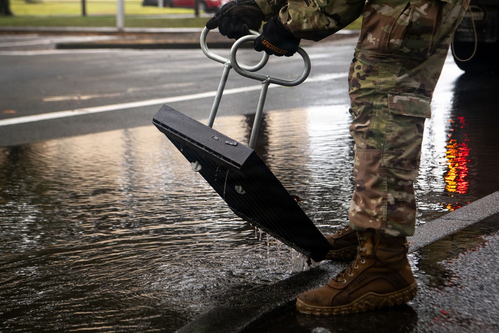 374 CES Airmen maintain installation readiness through storm, mitigating flood