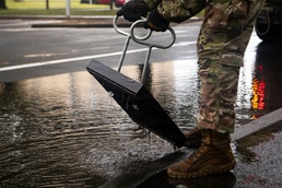 374 CES Airmen maintain installation readiness through storm, mitigating flood