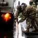 374 CES Airmen maintain installation readiness through storm, mitigating flood