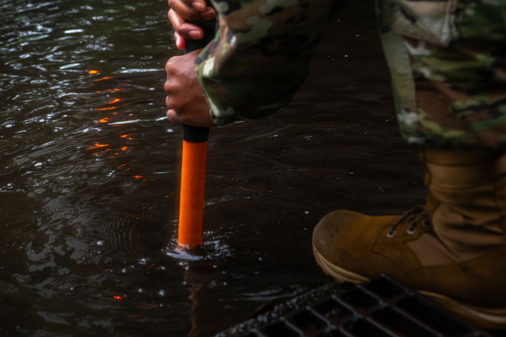 374 CES Airmen maintain installation readiness through storm, mitigating flood