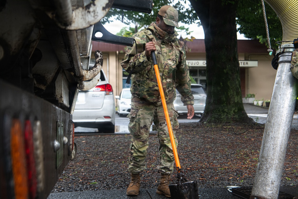 374 CES Airmen maintain installation readiness through storm, mitigating flood