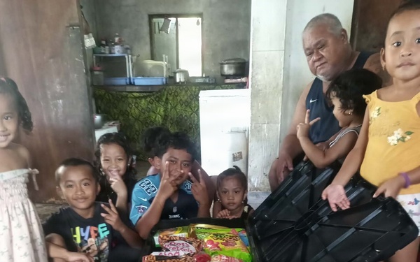 Yokota Airmen deliver humanitarian aid to typhoon-affected family
