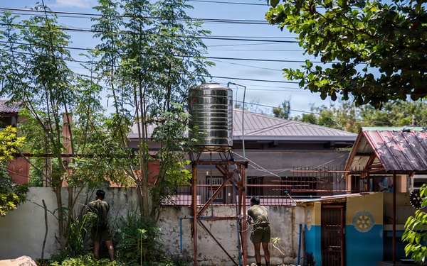 U.S. Marines and Philippine service members participate in Bobon Elementary Eskwela