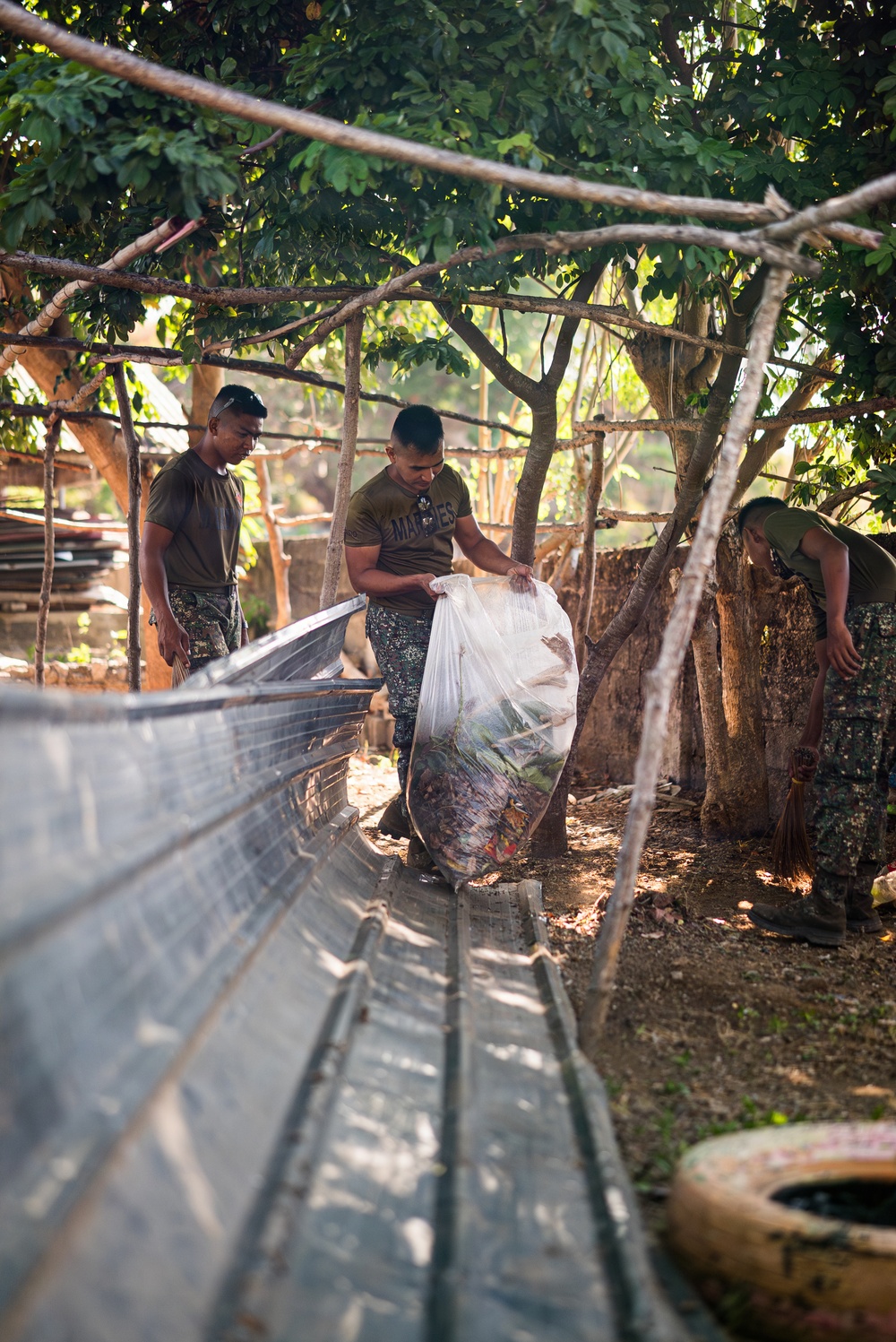 U.S. Marines and Philippine service members participate in Bobon Elementary Eskwela