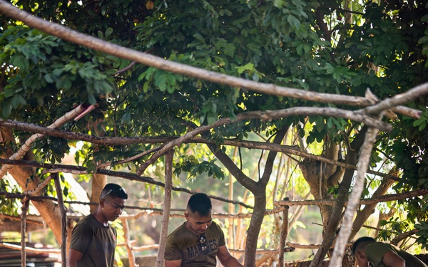 U.S. Marines and Philippine service members participate in Bobon Elementary Eskwela