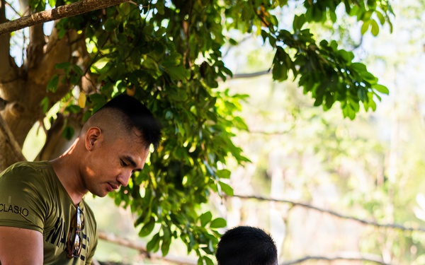 U.S. Marines and Philippine service members participate in Bobon Elementary Eskwela