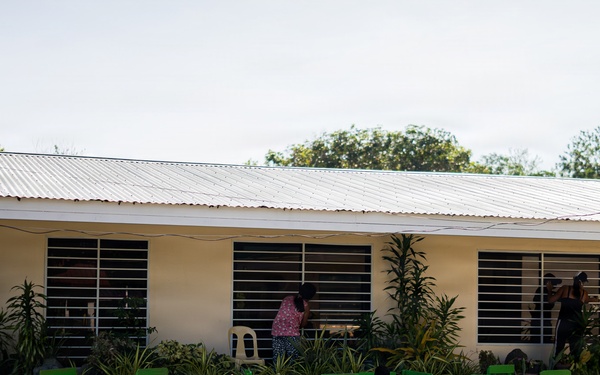 U.S. Marines and Philippine service members participate in Bobon Elementary Eskwela