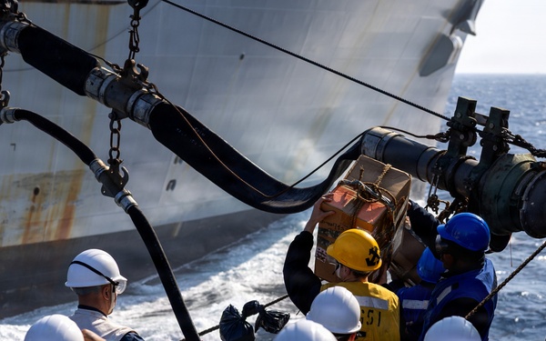 USS Arleigh Burke (DDG 51) Conducts Replenishment at Sea with the United States Naval Ship William Mclean (T-AKE 12)