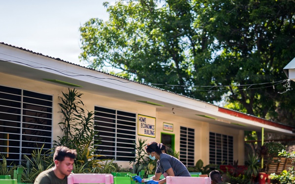 U.S. Marines and Philippine service members participate in Bobon Elementary Eskwela