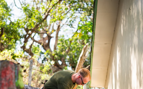U.S. Marines and Philippine service members participate in Bobon Elementary Eskwela